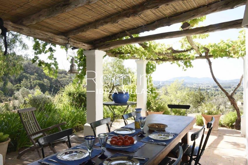 finca bridie ibiza-2pergola terrace dining area view hills