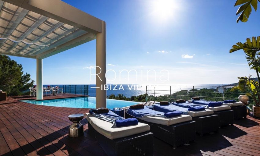 villa sedna ibiza-1pool terrace deck chairs sea view